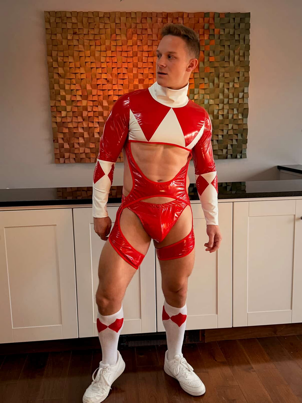 Joylgbt‘s  Men’s PU Leather Cutout Bodysuit – Red & White Geometric Long Sleeve Open Chest Design	